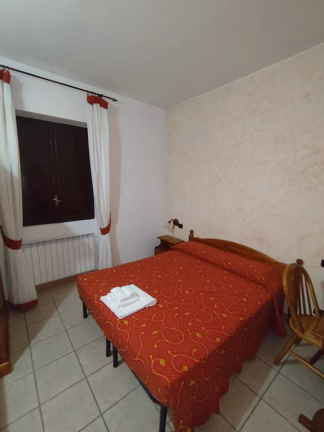 Camera da letto del Rifugio del Lupo a Scanno